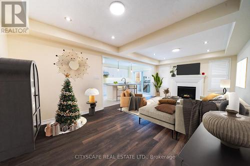 296 Jean Landing, Milton, ON - Indoor Photo Showing Living Room With Fireplace