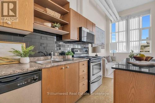 524 - 410 King Street W, Kitchener, ON - Indoor Photo Showing Kitchen With Double Sink