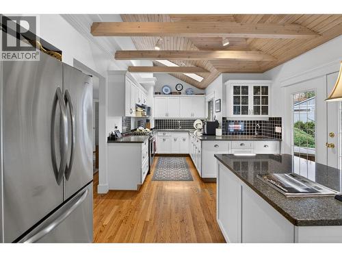 Newly renovated gally  kitchen with vaulted ceilings - 1774 Highland Drive N, Kelowna, BC - Indoor Photo Showing Kitchen