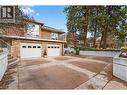 2 car garage with extra parking on side - 1774 Highland Drive N, Kelowna, BC  - Outdoor 