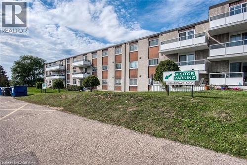 View of apartment building / complex - 71 Vanier Drive Unit# 211, Kitchener, ON - Outdoor With Balcony With Facade