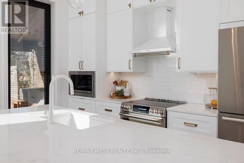 22 Cowan Avenue, Toronto, ON - Indoor Photo Showing Kitchen With Upgraded Kitchen
