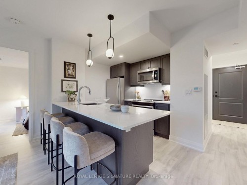 301-1400 Kingston Road, Toronto, ON - Indoor Photo Showing Kitchen With Upgraded Kitchen