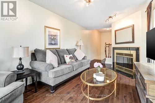 Family Room - 83 Winnegreen Court, Ottawa, ON - Indoor Photo Showing Living Room With Fireplace