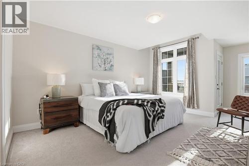 Bedroom with light carpet - 592 Mayapple Street, Waterloo, ON - Indoor Photo Showing Bedroom