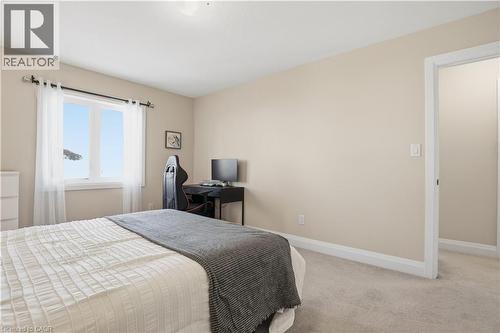 Bedroom featuring carpet floors and baseboards - 592 Mayapple Street, Waterloo, ON - Indoor Photo Showing Bedroom