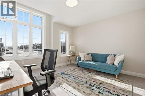 Carpeted office space with baseboards - 592 Mayapple Street, Waterloo, ON - Indoor Photo Showing Living Room
