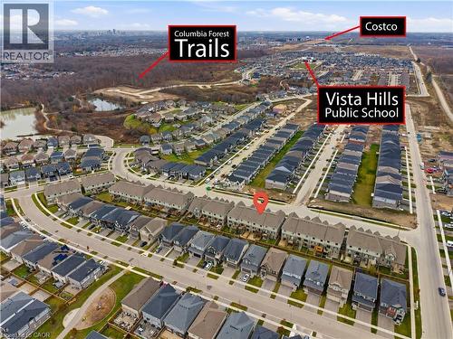 Aerial view of property's location with a nearby body of water and nearby suburban area - 592 Mayapple Street, Waterloo, ON - Outdoor With View