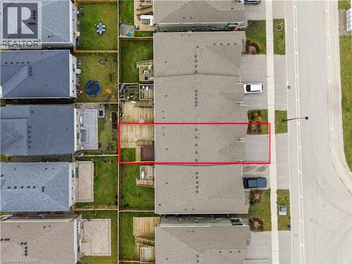 Aerial perspective of suburban area featuring property boundaries highlighted - 592 Mayapple Street, Waterloo, ON - 