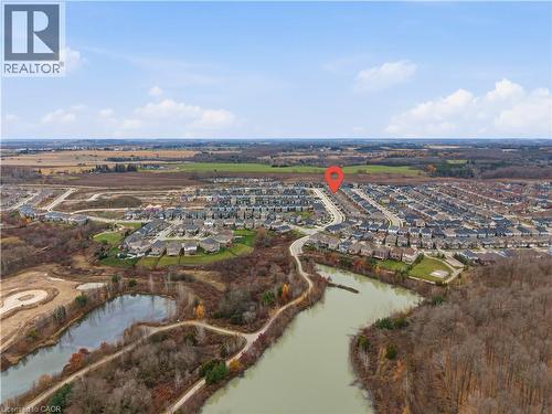 Aerial view of property and surrounding area featuring a nearby body of water - 592 Mayapple Street, Waterloo, ON - Outdoor With View