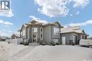 520 Couples Court, Warman, SK  - Outdoor With Facade 