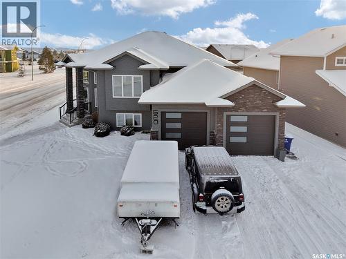 520 Couples Court, Warman, SK - Outdoor With Facade
