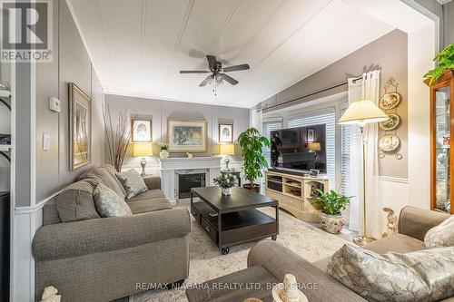 194 - 3033 Townline Road, Fort Erie (Black Creek), ON - Indoor Photo Showing Living Room With Fireplace