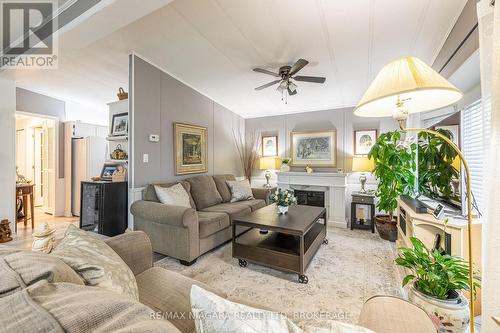 194 - 3033 Townline Road, Fort Erie (Black Creek), ON - Indoor Photo Showing Living Room With Fireplace