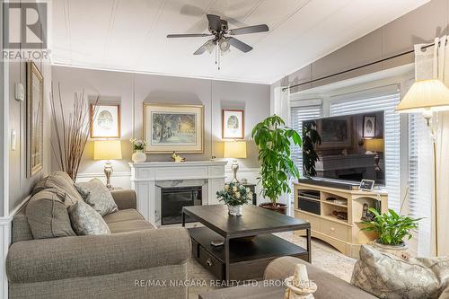 194 - 3033 Townline Road, Fort Erie (Black Creek), ON - Indoor Photo Showing Living Room With Fireplace