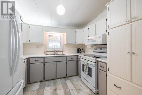 194 - 3033 Townline Road, Fort Erie (Black Creek), ON - Indoor Photo Showing Kitchen With Double Sink
