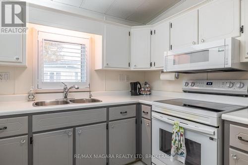 194 - 3033 Townline Road, Fort Erie (Black Creek), ON - Indoor Photo Showing Kitchen With Double Sink