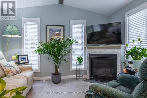 194 - 3033 Townline Road, Fort Erie (Black Creek), ON - Indoor Photo Showing Living Room With Fireplace