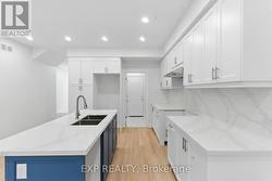 garage access and main floor laundry - 