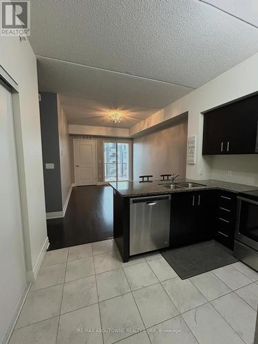 411 - 620 Sauve Street E, Milton, ON - Indoor Photo Showing Kitchen With Double Sink