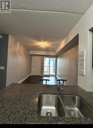 411 - 620 Sauve Street E, Milton, ON - Indoor Photo Showing Kitchen With Double Sink