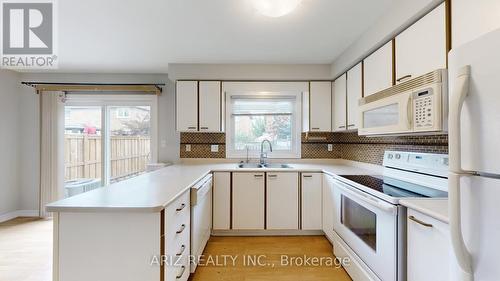 3360 Scotch Pine Gate, Mississauga, ON - Indoor Photo Showing Kitchen With Double Sink