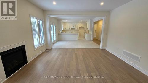 61 Ruby Ridge, Oro-Medonte, ON - Indoor Photo Showing Other Room With Fireplace