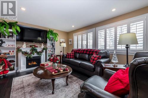 Living room - 10 South Boulevard, Innisfil, ON - Indoor Photo Showing Living Room With Fireplace