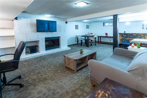 10 Larter Crescent, Winnipeg, MB - Indoor Photo Showing Living Room With Fireplace