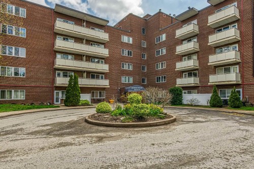 220-198 Scott Street, St. Catharines, ON - Outdoor With Facade