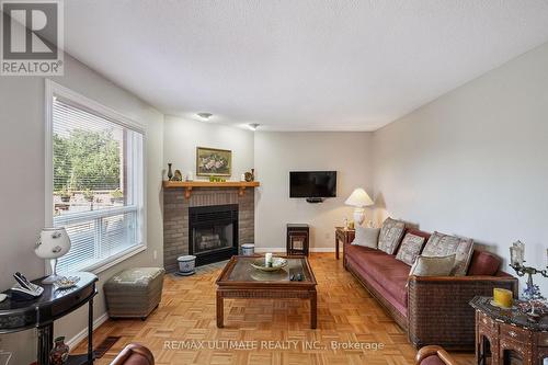961 Focal Road, Mississauga, ON - Indoor Photo Showing Living Room With Fireplace