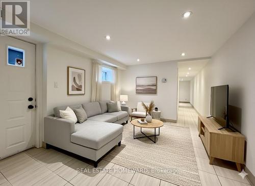 Photo virtually staged - Lower - 220 Pape Avenue, Toronto, ON - Indoor Photo Showing Living Room