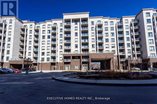 501 - 2486 Old Bronte Road, Oakville, ON - Outdoor With Balcony With Facade