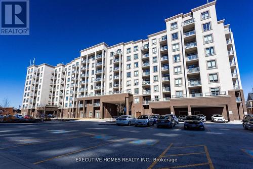 501 - 2486 Old Bronte Road, Oakville, ON - Outdoor With Balcony With Facade