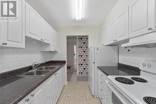 707 - 10330 Yonge Street W, Richmond Hill, ON - Indoor Photo Showing Kitchen With Double Sink
