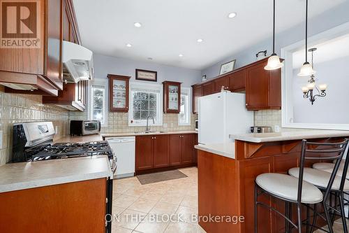 589 River Road E, Wasaga Beach, ON - Indoor Photo Showing Kitchen With Double Sink