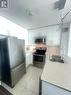 1406 - 3985 Grand Park Drive, Mississauga, ON  - Indoor Photo Showing Kitchen With Stainless Steel Kitchen With Double Sink 