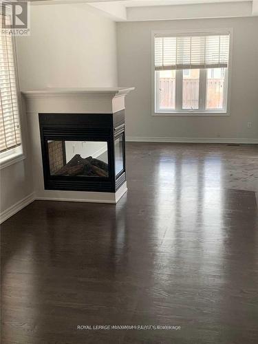 8 Tustin Road, Brampton, ON - Indoor Photo Showing Other Room With Fireplace