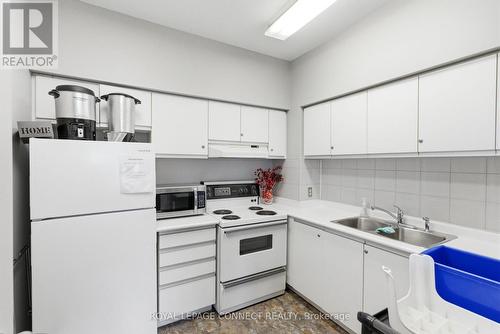 514 - 711 Rossland Road E, Whitby, ON - Indoor Photo Showing Kitchen With Double Sink