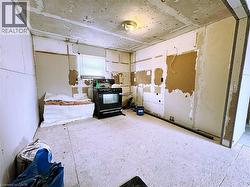 Kitchen with black gas stove - 