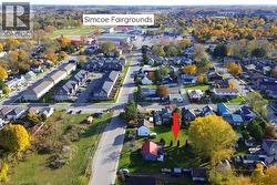 Aerial overview of property's location with nearby suburban area - 