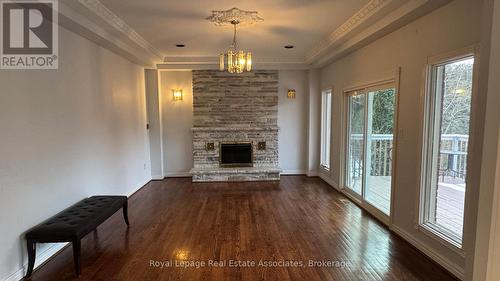 Upper - 2501 Mississauga Road, Mississauga, ON - Indoor Photo Showing Living Room With Fireplace