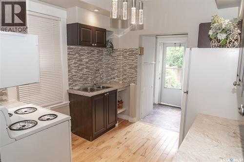409 29Th Street W, Saskatoon, SK - Indoor Photo Showing Kitchen With Double Sink