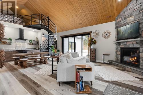 679 Boulder Road, South River, ON - Indoor Photo Showing Living Room With Fireplace