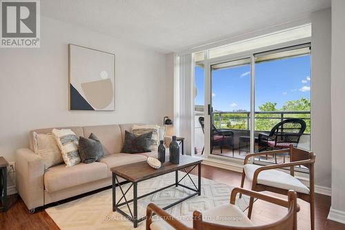 309 - 2391 Central Park Drive, Oakville, ON - Indoor Photo Showing Living Room
