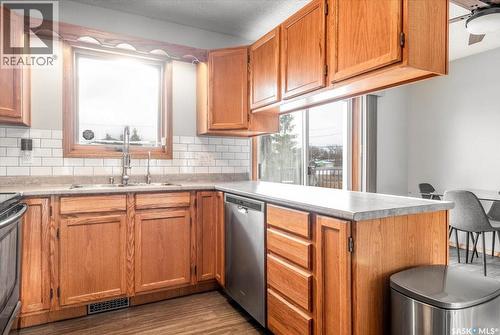 4317 3Rd Avenue N, Regina, SK - Indoor Photo Showing Kitchen With Double Sink