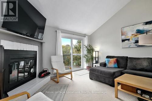 38 - 127 Alfred Street W, Blue Mountains, ON - Indoor Photo Showing Living Room With Fireplace
