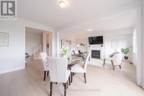 129 Busato Drive, Whitchurch-Stouffville, ON - Indoor Photo Showing Dining Room With Fireplace