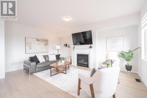 129 Busato Drive, Whitchurch-Stouffville, ON - Indoor Photo Showing Living Room With Fireplace