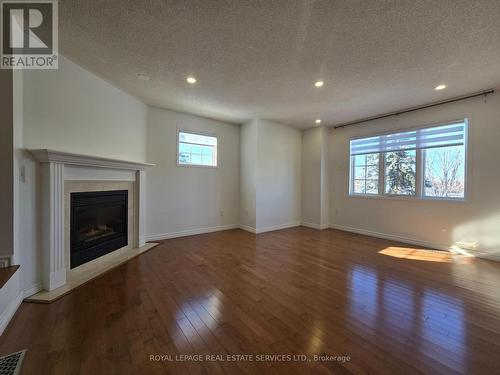 Upper - 2932 Cape Hill Crescent, Mississauga, ON - Indoor Photo Showing Living Room With Fireplace